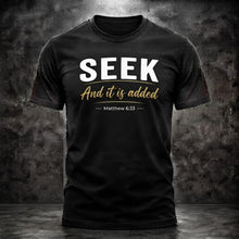 Load image into Gallery viewer, Black Seek and It Is Added T-shirt with Matthew 6:33 reference
